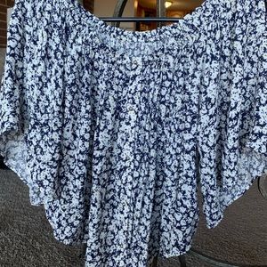 Floral blouse with statement sleeves